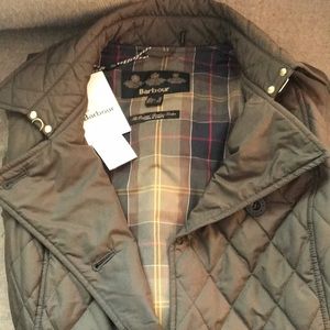 Brand New Barbour Coat . Size 8 . Deep Green with beautiful plaid inlay.